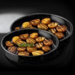 Set of 2 round enamel molds 26X6 / 32X6 cm ENAMELWARE black